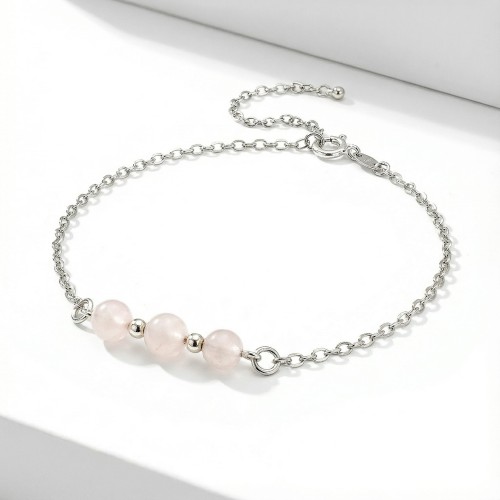 Srebrna bransoletka z naturalnym kwarcem różowym jasne srebro 925 zbliżenie na różowe kule