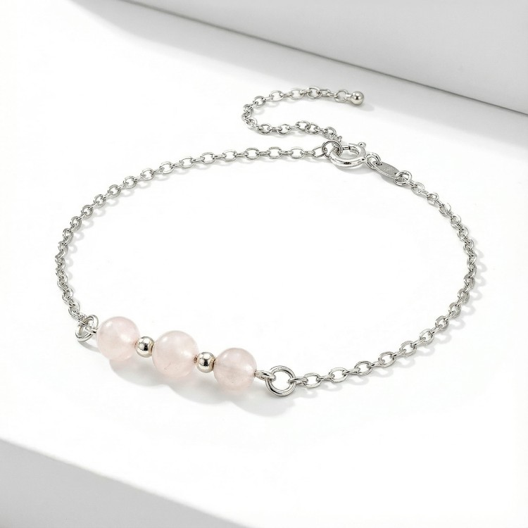 Srebrna bransoletka z naturalnym kwarcem różowym jasne srebro 925 zbliżenie na różowe kule