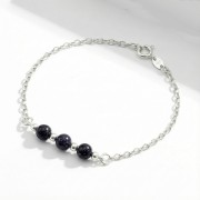 Srebrna bransoletka Noc Kairu jasne srebro 925 zbliżenie na granatowe iskrzące kule
