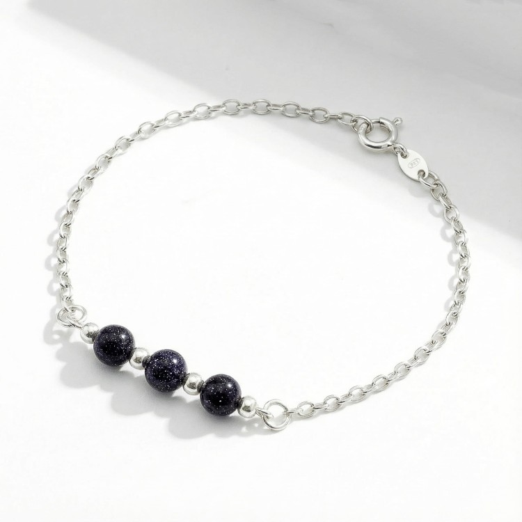 Srebrna bransoletka Noc Kairu jasne srebro 925 zbliżenie na granatowe iskrzące kule