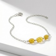 Srebrna bransoletka z naturalnym żółtym turmalinem jasne srebro 925 nieregularne bryłki słoneczne kamienie