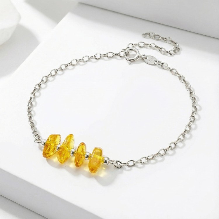 Srebrna bransoletka z naturalnym bursztynem bałtyckim jasne srebro 925 złociste bryłki kamieni