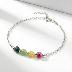 Srebrna bransoletka z naturalnym kolorowym turmalinem jasne srebro 925 zbliżenie na kule multikolor