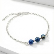 Srebrna bransoletka z naturalnym jaspisem jasne srebro 925 zbliżenie na wzorzyste kamienie