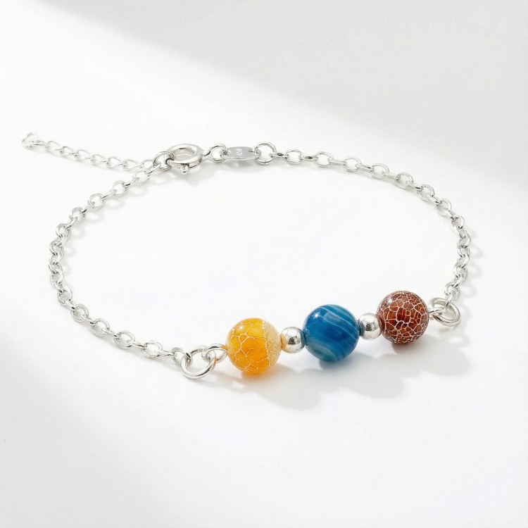 Srebrna bransoletka z naturalnym agatem jasne srebro 925 zbliżenie na wzorzyste kamienie