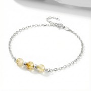 Srebrna bransoletka z naturalnym cytrynem jasne srebro 925 zbliżenie na żółte kamienie