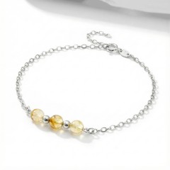 Srebrna bransoletka z naturalnym cytrynem jasne srebro 925 zbliżenie na żółte kamienie